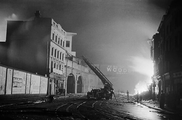 A turntable ladder of the London Fire Brigade tacklest fires close to Waterloo railway