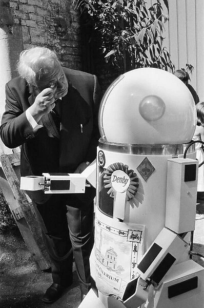 TV Astrologer Patrick Moore meets Denby the robot, which talks, shakes hands and more