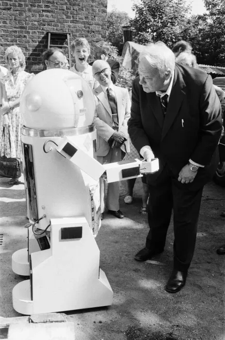 Framed Print : TV Astrologer Patrick Moore meets Denby the robot, which talks, shakes hands and more Framed Print : TV Astrologer Patrick Moore meets Denby the robot, which talks, shakes hands and more