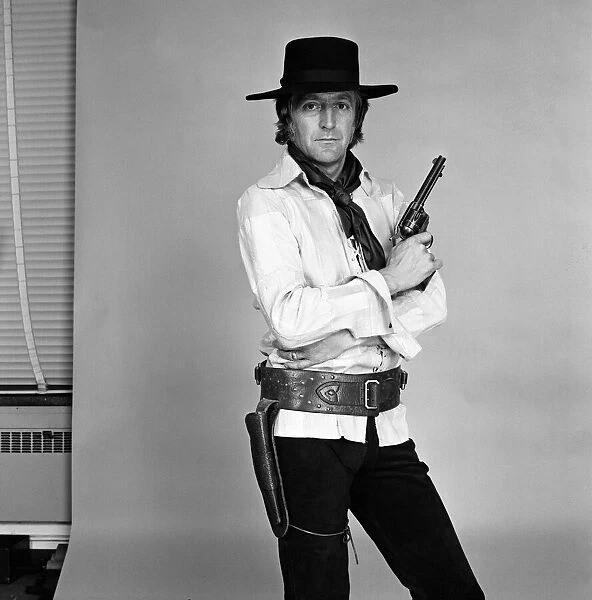 TV personality Michael Parkinson dressed in cowboy attire. 28th September 1972