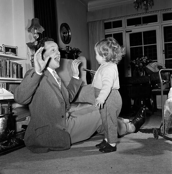 TV Personality Nicholas Parsons and daughter Zuleika. 25th February 1960