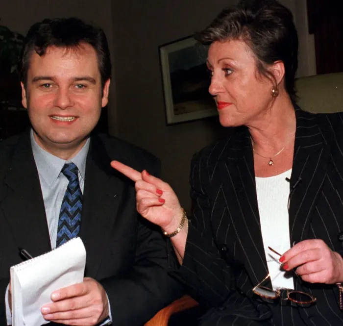 Framed Print : TV Presenter Eamonn Holmes swaps places with his PA Gill Stacey at the launch of the new Framed Print : TV Presenter Eamonn Holmes swaps places with his PA Gill Stacey at the launch of the new