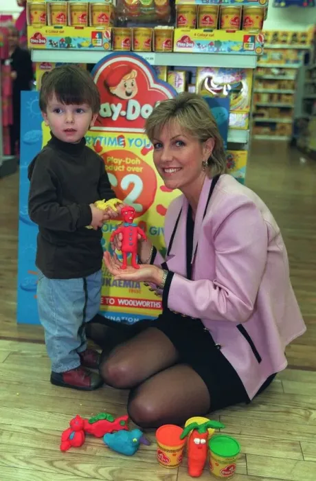 Framed Print : Tv Presenter Jill Dando and Oliver play with some Play Doh in Woolworths A© Framed Print : Tv Presenter Jill Dando and Oliver play with some Play Doh in Woolworths A©
