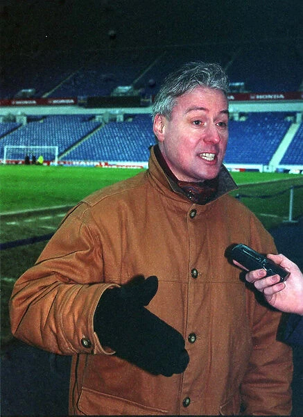 TV Presenter Jim White at Ibrox Stadium being interviewed - February 1998