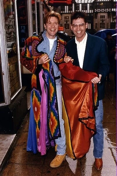 TV Presenter Phillip Schofield handing over The Dreamcoat to Darren Day who will go on to