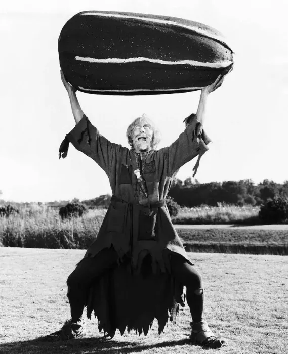 Framed Print : TV Progs Catweazle starring Geoffrey Bayldon Actor as Catweazle here holding up a giant