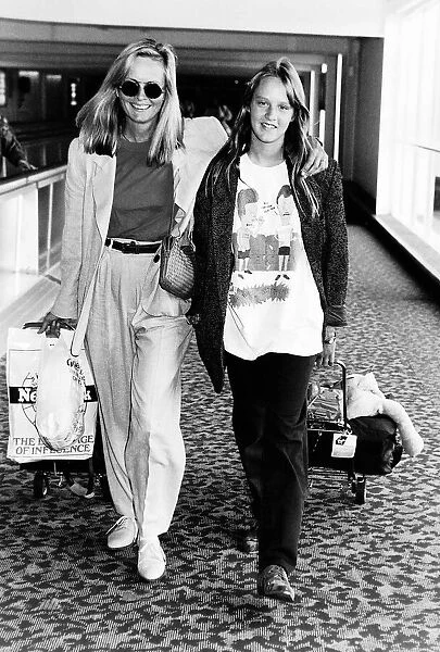 Twiggy model with her daughter Carly leaving Heathrow Airport