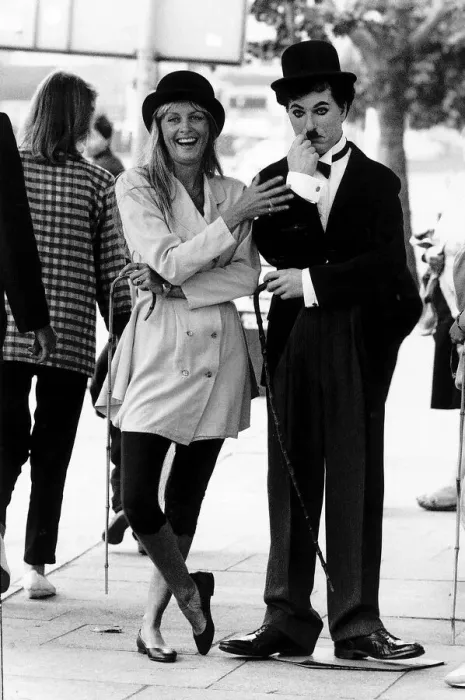 Framed Print : Twiggy Model with man dressed up as Charlie Chaplin