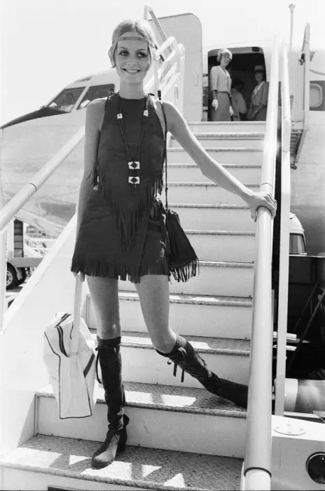 Framed Print : Twiggy, (real name Leslie Hornby) English model, seen in a Hippie gear outfit leaving Framed Print : Twiggy, (real name Leslie Hornby) English model, seen in a Hippie gear outfit leaving