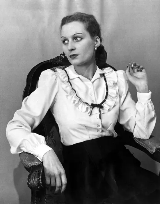 Framed Print : Two-way blouse Fashion clothing shoot January 1948 Woman reclining in chair Framed Print : Two-way blouse Fashion clothing shoot January 1948 Woman reclining in chair