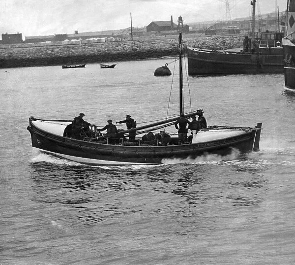 A Tynemouth lifeboat sails along smoothly in calm waters. 3rd June 1931