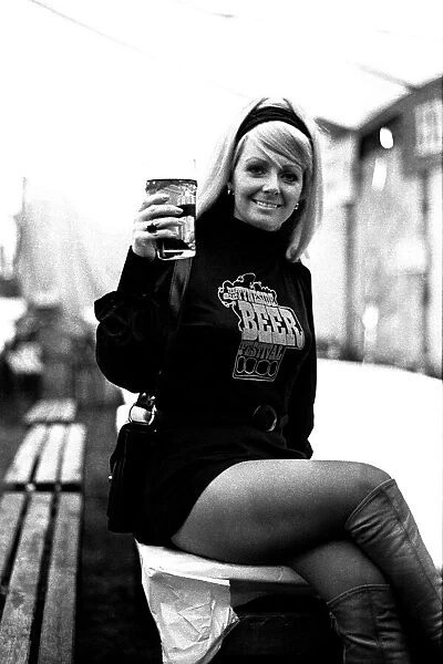 The Tyneside Beer Festival at Gosforth 22 April 1973 - A young girl enjoying pint
