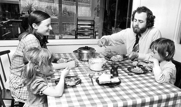 A typical family sitting down to their evening meal in 1975
