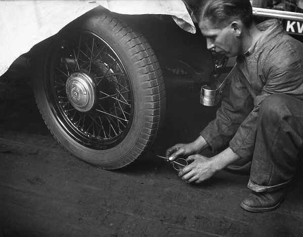 Tyres checked on the assembly line at the Triumph car factory in Coventry