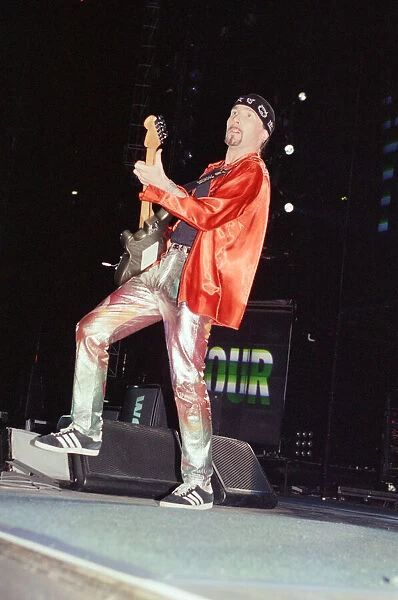 U2 in concert, Zoo TV Tour, Wembley Stadium. The Edge pictured on stage. 11th August 1993