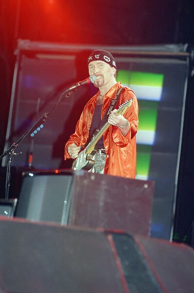 U2 in concert, Zoo TV Tour, Wembley Stadium. The Edge pictured on stage. 11th August 1993
