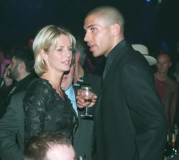 Framed Print : Ulrika Jonsson television presenter February 1998 Aston Villa striker Stan Collymore Framed Print : Ulrika Jonsson television presenter February 1998 Aston Villa striker Stan Collymore