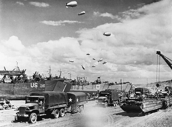Unloading of equipment into a beach from LSTs (Landing Ship
