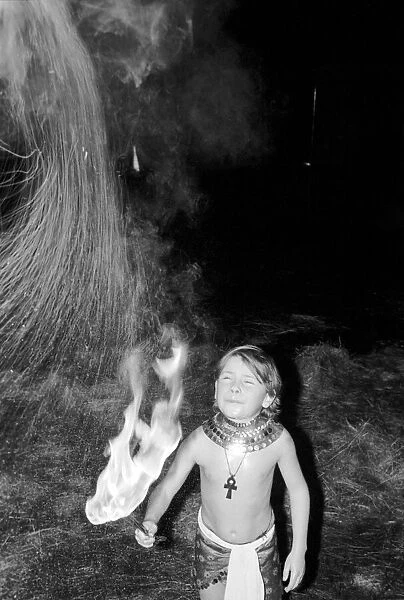 Unusual: Children. Fire Eater. 9 year old Tony Walls. Tony spitting a ball of flame