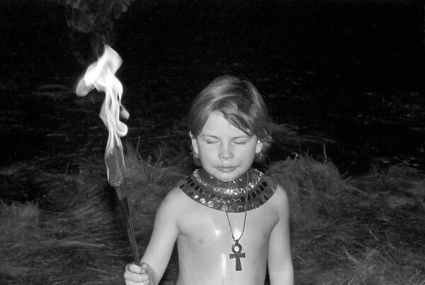 Unusual: Children. Fire Eater. 9 year old Tony Walls. December 1976 76-07502-009