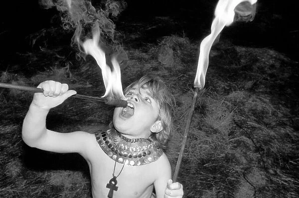 Unusual: Children. Fire Eater. 9 year old Tony Walls. Tony at his Fire Swallowing Act