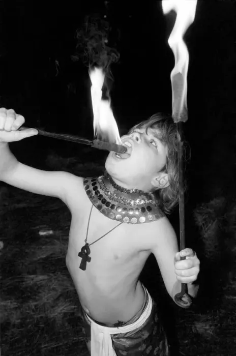 Framed Print : Unusual: Children. Fire Eater. 9 year old Tony Walls. Tony at his Fire Swallowing Act