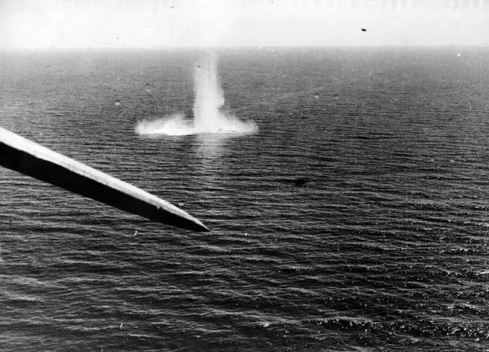 Framed Print : As the upheaval from a stick of bombs dropped by a Sunderland aircraft subsides an Framed Print : As the upheaval from a stick of bombs dropped by a Sunderland aircraft subsides an