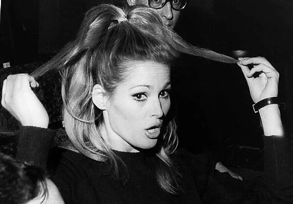 Ursula Andress actress pulling at hair 1966 during stage rehearsals