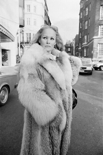 Ursula Andress, Swiss film actress, pictured outside her hotel, The Dorchester in London