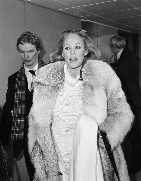 Ursula Andress, Swiss film actress, pictured arriving at London Heathrow Airport