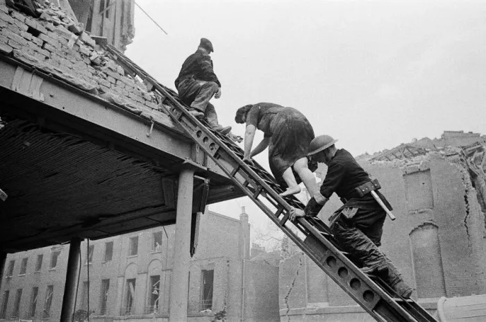 Framed Print : V2 Rocket incident at Sidmouth St. Casualties being removed by the N. F. S Framed Print : V2 Rocket incident at Sidmouth St. Casualties being removed by the N. F. S