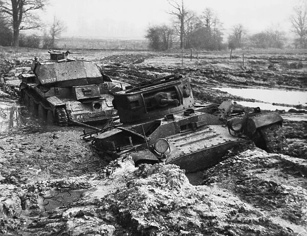 Valentine tank tows a Cruiser Mk IV through mud. 16th March 1943