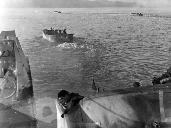 Valentine tanks leaving the ramp of a landing craft and entering the sea about 3000 yards