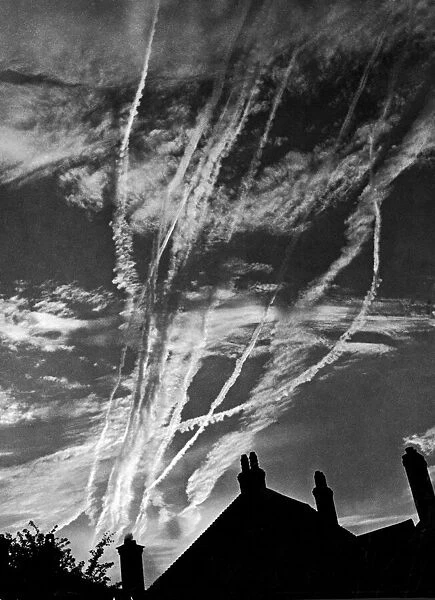 Vapour trails over London as planes speed to Normandy, Northern France during the Second