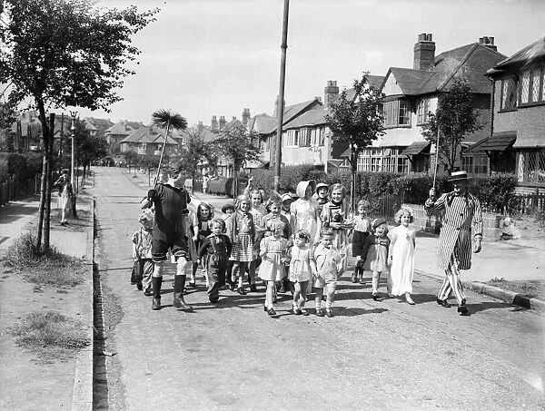 A VE Day fancy dress parade in a Birmingham suburb 1945