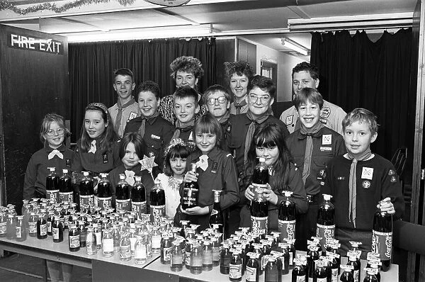 We ve got a lot of bottle... Scouts, Guides and Brownies man the bottle stall at