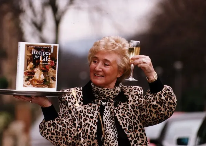 Framed Print : Vera Weisfeld launch her book Recipes for Life toast with glass of champagne leopard skin Framed Print : Vera Weisfeld launch her book Recipes for Life toast with glass of champagne leopard skin