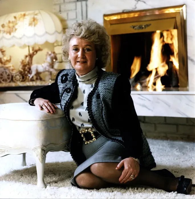 Framed Print : Vera Weisfeld sitting on white fire side rug leaning on foot stool grey Framed Print : Vera Weisfeld sitting on white fire side rug leaning on foot stool grey