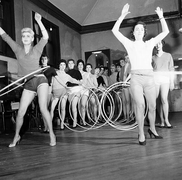The Vernon Girls, singing and dance group, pictured trying out Hula hoops during