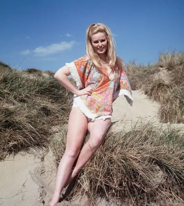 Framed Print : Veronica Carlsone actress who appeared in Hammer Horror films, poses on Camber Sands Framed Print : Veronica Carlsone actress who appeared in Hammer Horror films, poses on Camber Sands