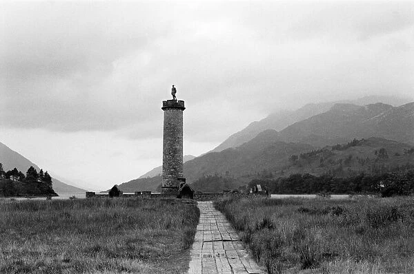 Vew of the Glenfinnan monument at the head of Loch Shiel near Fortwilliam
