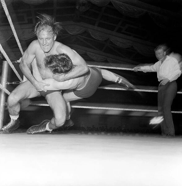 Vic Coleman vs. Cab Cash Ford at the town hall Wimbledon. May 1953 D5264