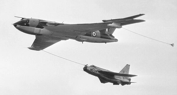A Vickers Victor tanker aircraft refuelling an English Electrics Lightning seen here