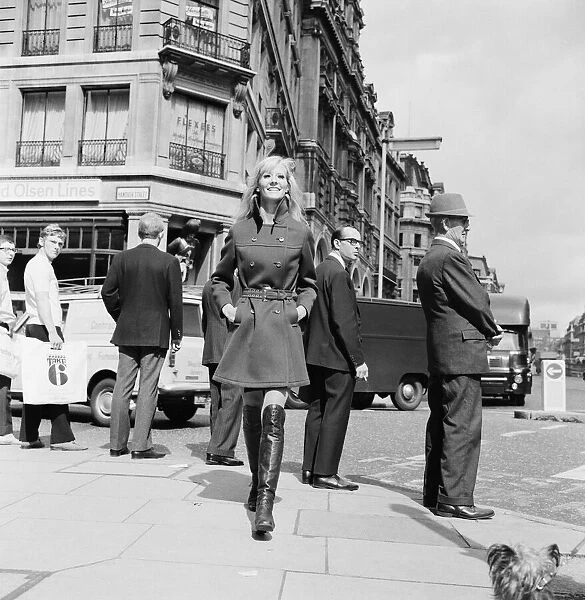 Vicki Hodge, model, photographed in Regent Street, in a long-short coat