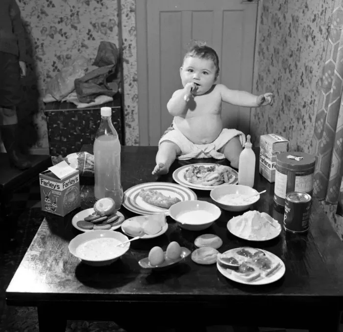Framed Print : Victor Reay 2 1 / 2 stone 7 month old baby sitting on table with the food that Framed Print : Victor Reay 2 1 / 2 stone 7 month old baby sitting on table with the food that