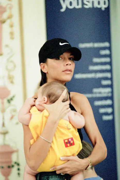 Framed Print : Victoria Beckham and baby son, Brooklyn Beckham, pictured out during shopping trip Framed Print : Victoria Beckham and baby son, Brooklyn Beckham, pictured out during shopping trip