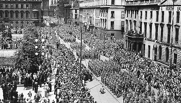 Victory Day Celebrations in Glasgow. Parade going along North side of George Square