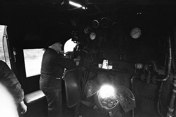 A view from the footplate of locomotive number 34021. A Bulleid Pacific engine of