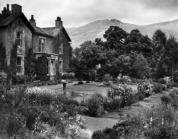The view of Grasmere from a manor house in the valley below, Cumbria. 6th July 1949