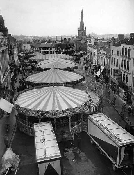 View of the Mop Fair taking place in High Town, Hereford, Circa 1950